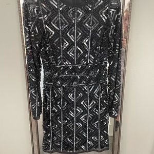 Gianni Bini Cocktail dress size 2 . Great Blue grey color with amazing detail.